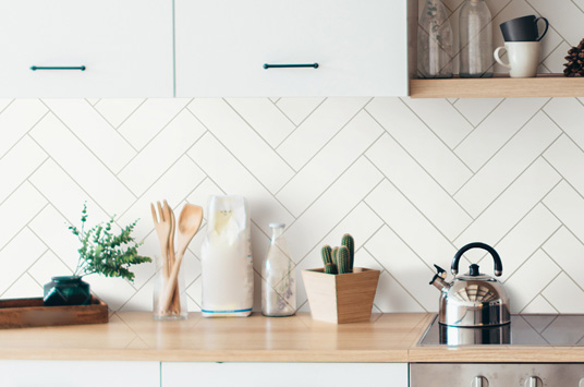 Metro White Ceramic Tile Backsplash in kitchen